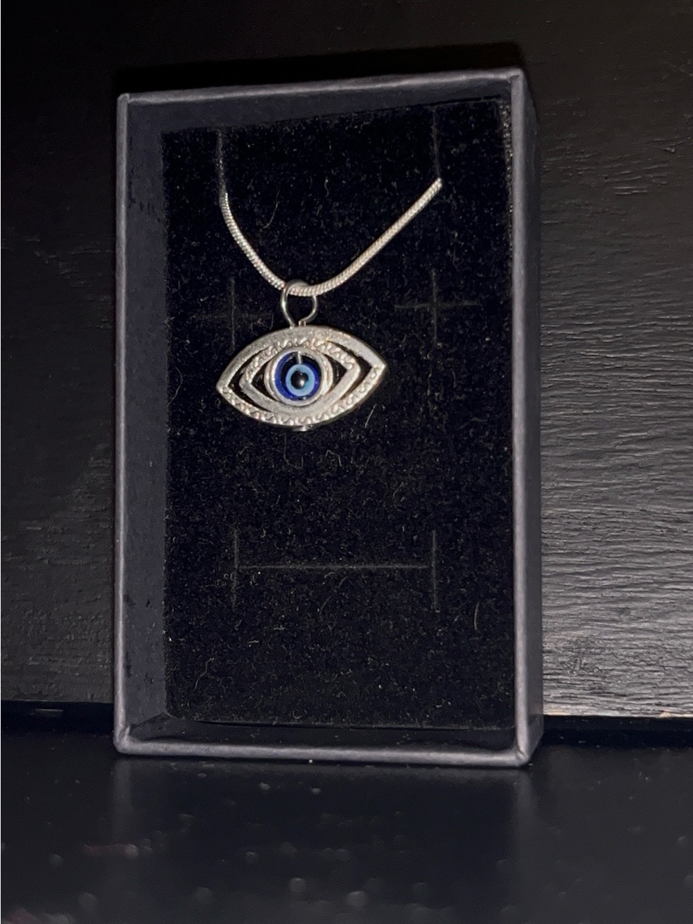 Silver Evil Eye Pendant Necklace with Blue Center